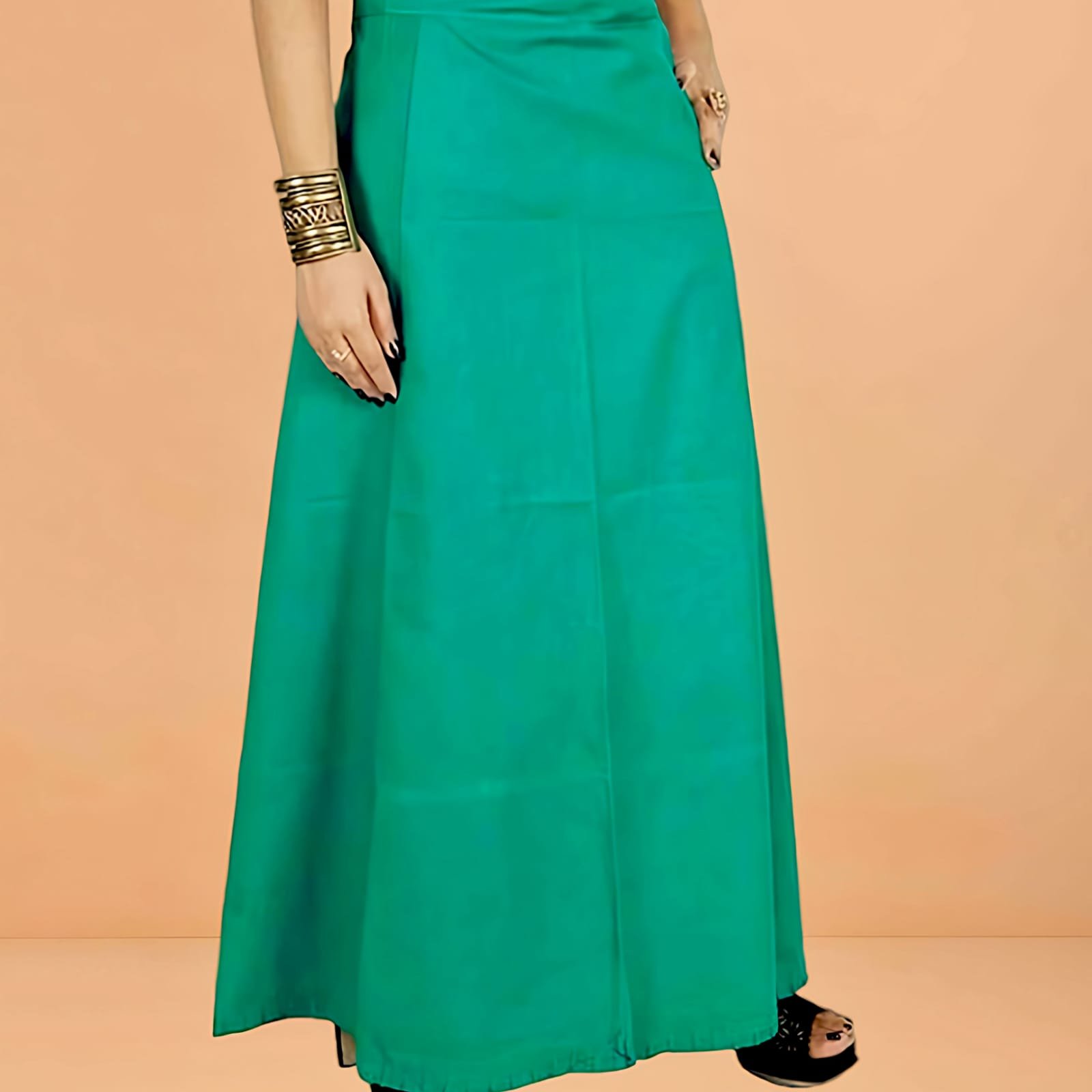 An essential undergarment worn under a traditional Indian saree to hold the drapery in place and provide a clean silhouette.